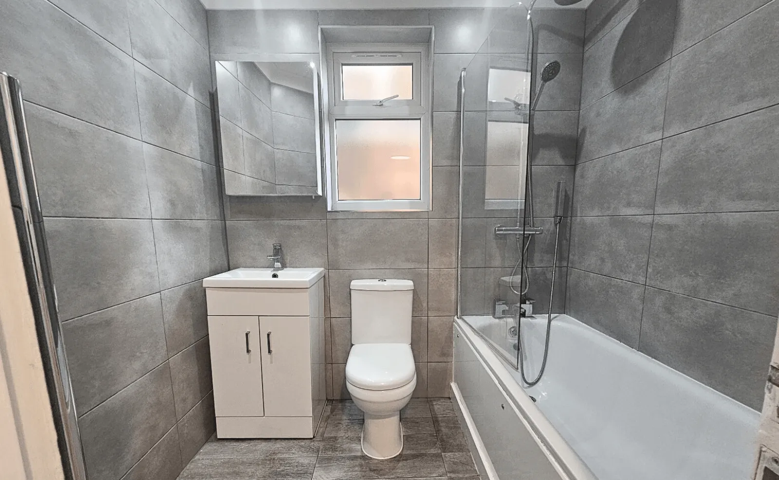 Bathroom with bath before renovation