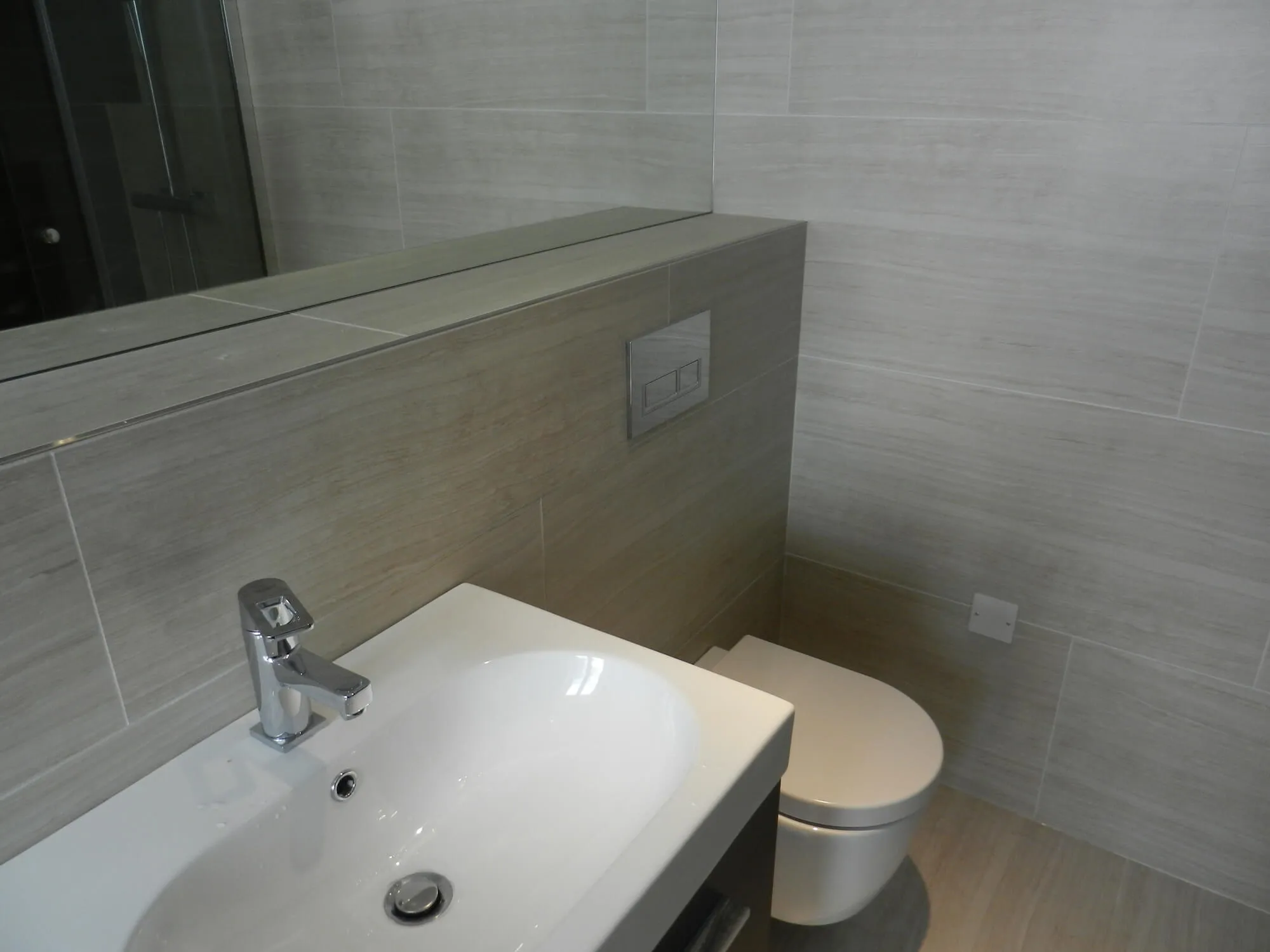 Completed shower room by Cube Tiling & Bathrooms